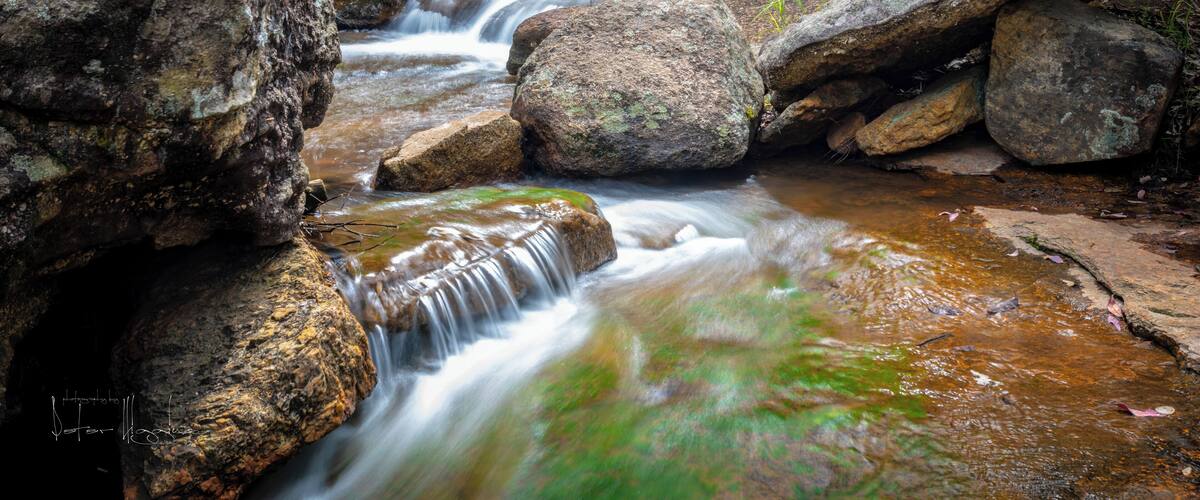 One of the many waterfalls in the gardens