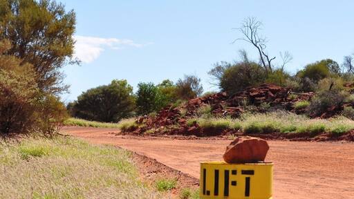 We needed a permit to enter Aboriginal land, but were welcomed with some fun roadside signs along the way. (This one is asking us not to speed...)