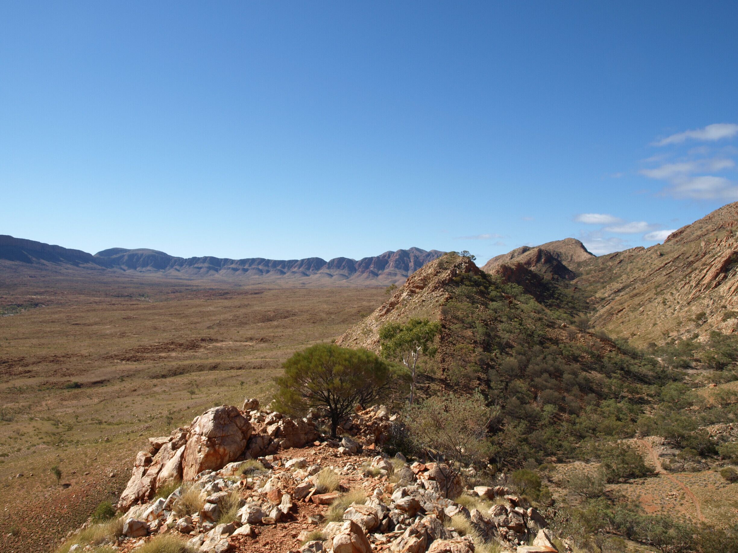 The super spectacular view over the Ormiston Gorge Pound in Central Australia makes the long upwards climb all worthwhile!!

If there is no-one else on this walk when you do it (which I was lucky enough to have) it feels like you are the only person on earth for just a fleeting moment!

It takes 3-4 hours so make sure you allow plenty of time, take a litre of water per hour of walking and leave very early in the hotter months. 

I personally don't recommended long hikes at all in central Australia in the middle of summer with temperatures regularly soaring above 40degree Celsius. The best time to visit is the middle months of the year. 