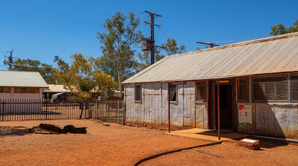 Hermannsburg featuring farmland, a small town or village and desert views