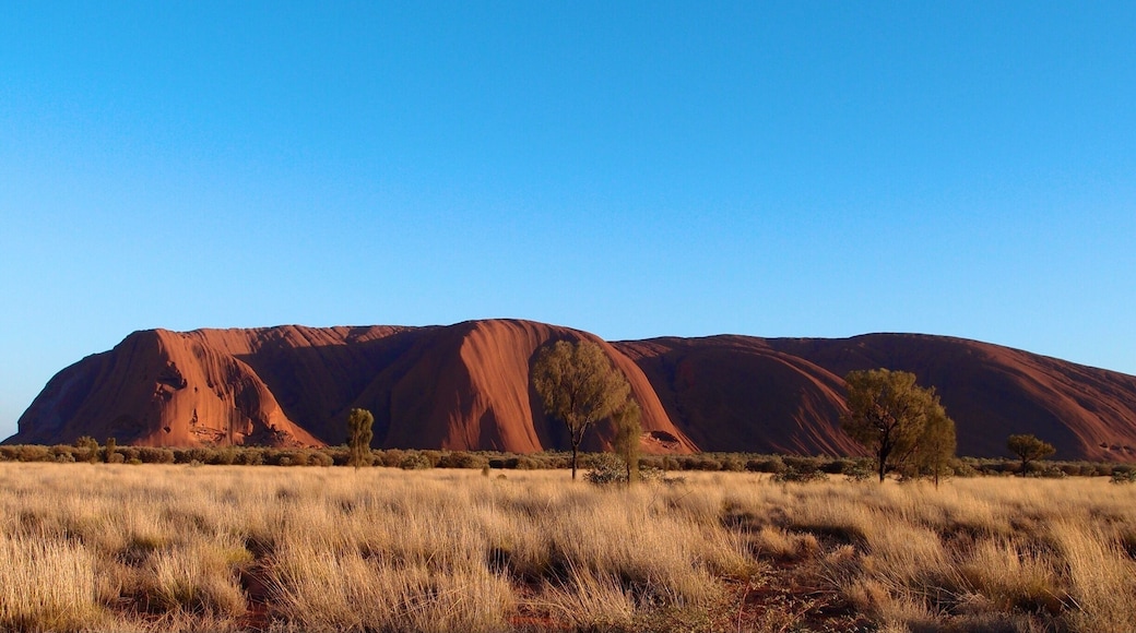 Ayers Rock now known as Uluru. You can't get the enormous scale of the rock until you visit for yourself. Don't go in Summer, it is way too hot.