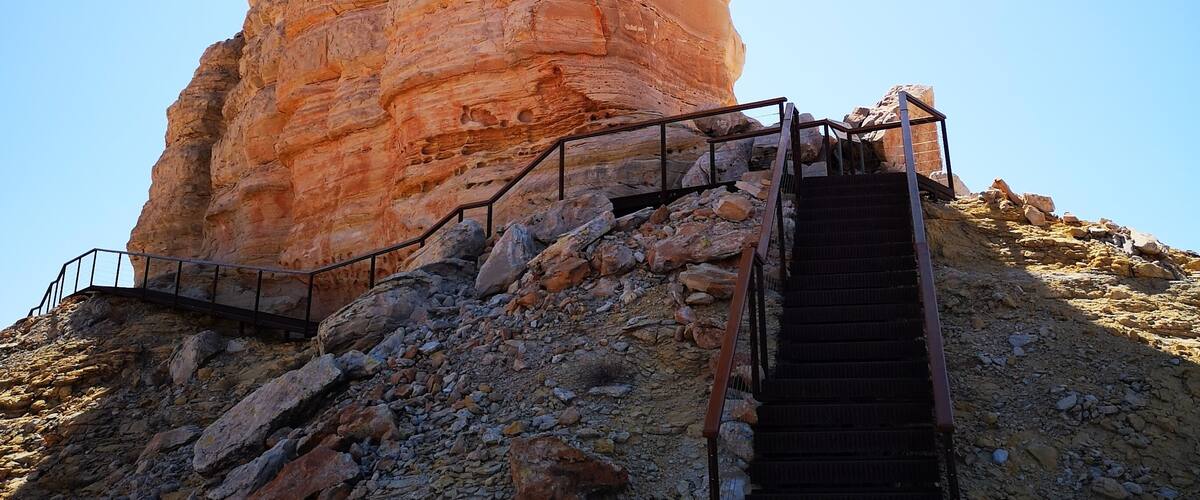 Located on the north-western edge of the Simpson Desert this sandstone formation is only accessible with 4WD and some driving skill. We went with Outback Elite Tours and were not disappointed. There is a campground and picnic facilities, including some of the least stinky drop toilets I have encountered in National Parks in Australia. There are a lot of stairs up to the base of the pillar, but it is well worth it for the view over the Simpson Desert.