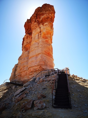 Located on the north-western edge of the Simpson Desert this sandstone formation is only accessible with 4WD and some driving skill. We went with Outback Elite Tours and were not disappointed. There is a campground and picnic facilities, including some of the least stinky drop toilets I have encountered in National Parks in Australia. There are a lot of stairs up to the base of the pillar, but it is well worth it for the view over the Simpson Desert.