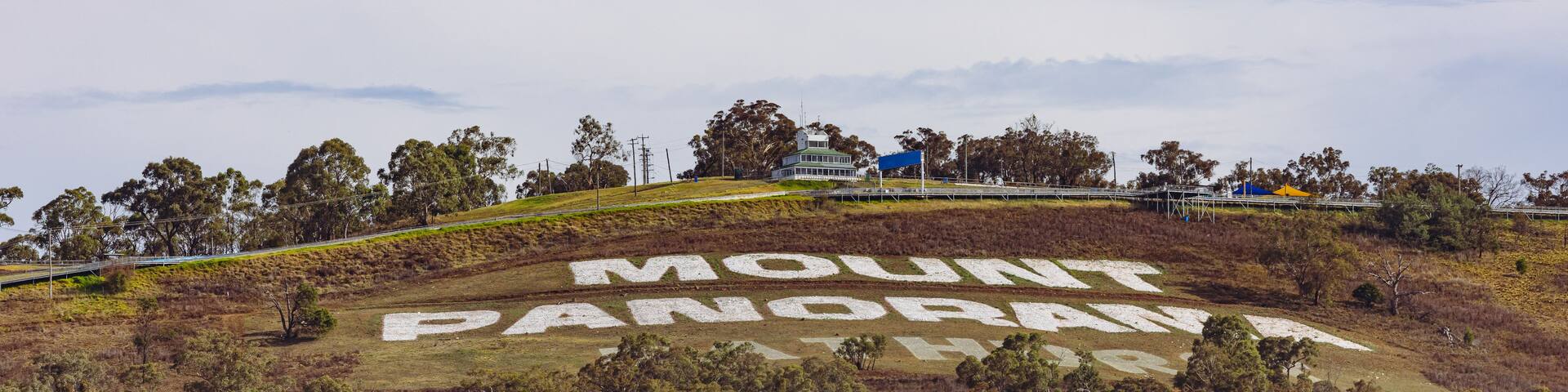 A hill with the words 'Mount Panorama' painted on it.