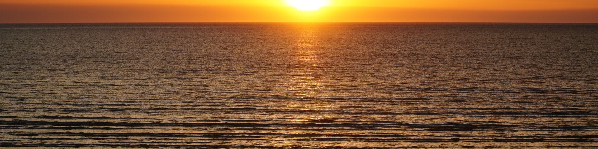Sunset over Darwin Beach in the Northern Territory, Australia.