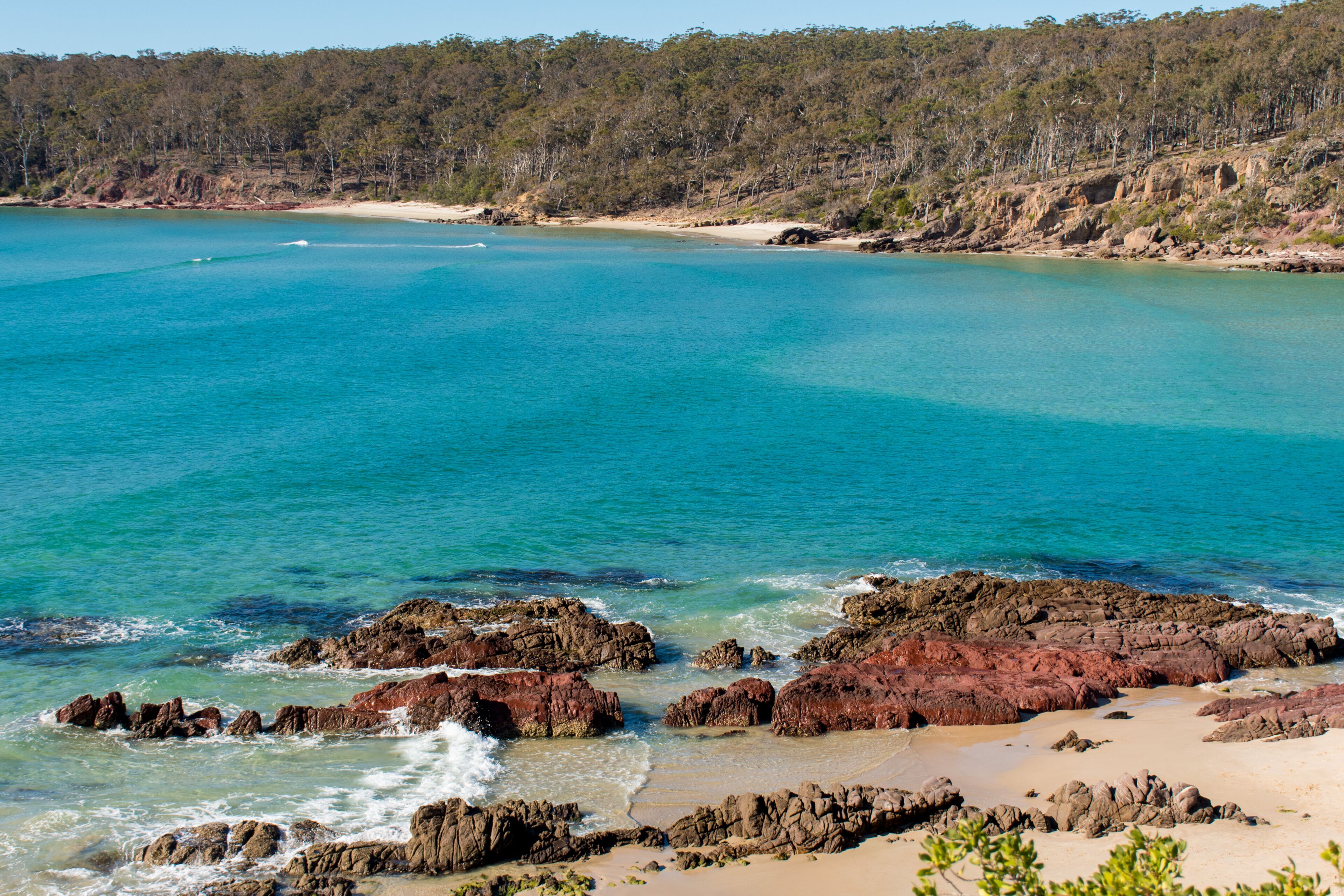 Scenic view of a beautiful ocean beach on a sunny day. Idyllic Pambula Beach on Sapphire Coast near Merimbula, NSW, Australia