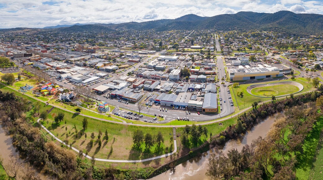 Aerial panorama of a regional town of Tamworth between a river and distant mountain