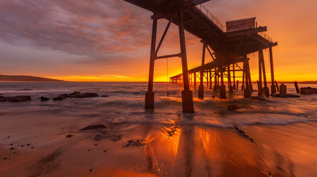 Beautiful, vivid, autumn, sunrise over Historic Wallarah Jetty .Catherine Hill Bay. Central Coast of N.S.W. Australia.