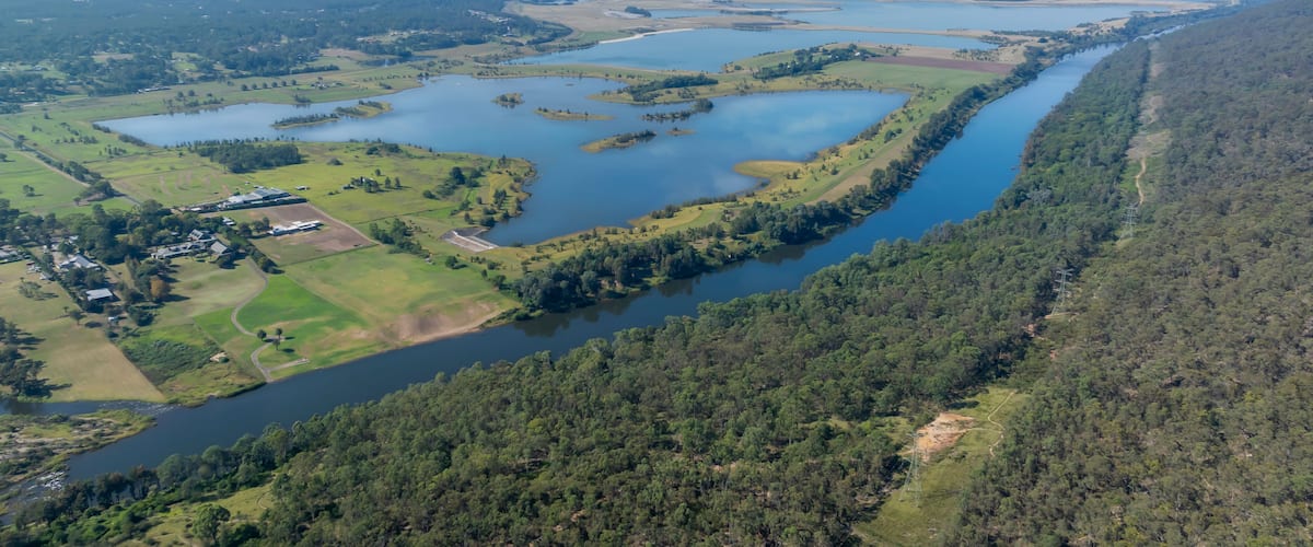 Drone aerial photograph of the Nepean River running through the Cumberland Plain region alongside Nepean Lagoon and Penrith Lake in Western Sydney in New South Wales, Australia.