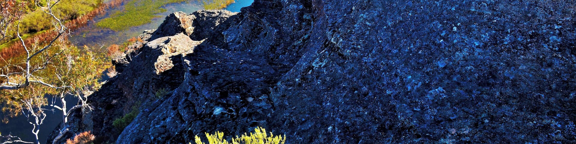 I'm amazed that this place is on the the list. It's a delightful backwater that once was a dam used by a nearby concrete factory. When it became no longer relevant, national parks took it over. The main camping area is below the hill on the left. To get to this point you ideally need a canoe or kayak and paddle down before climbing about 500 metres to this outcrop, similar to so many outcrops in the park. They're called pagoda formations.