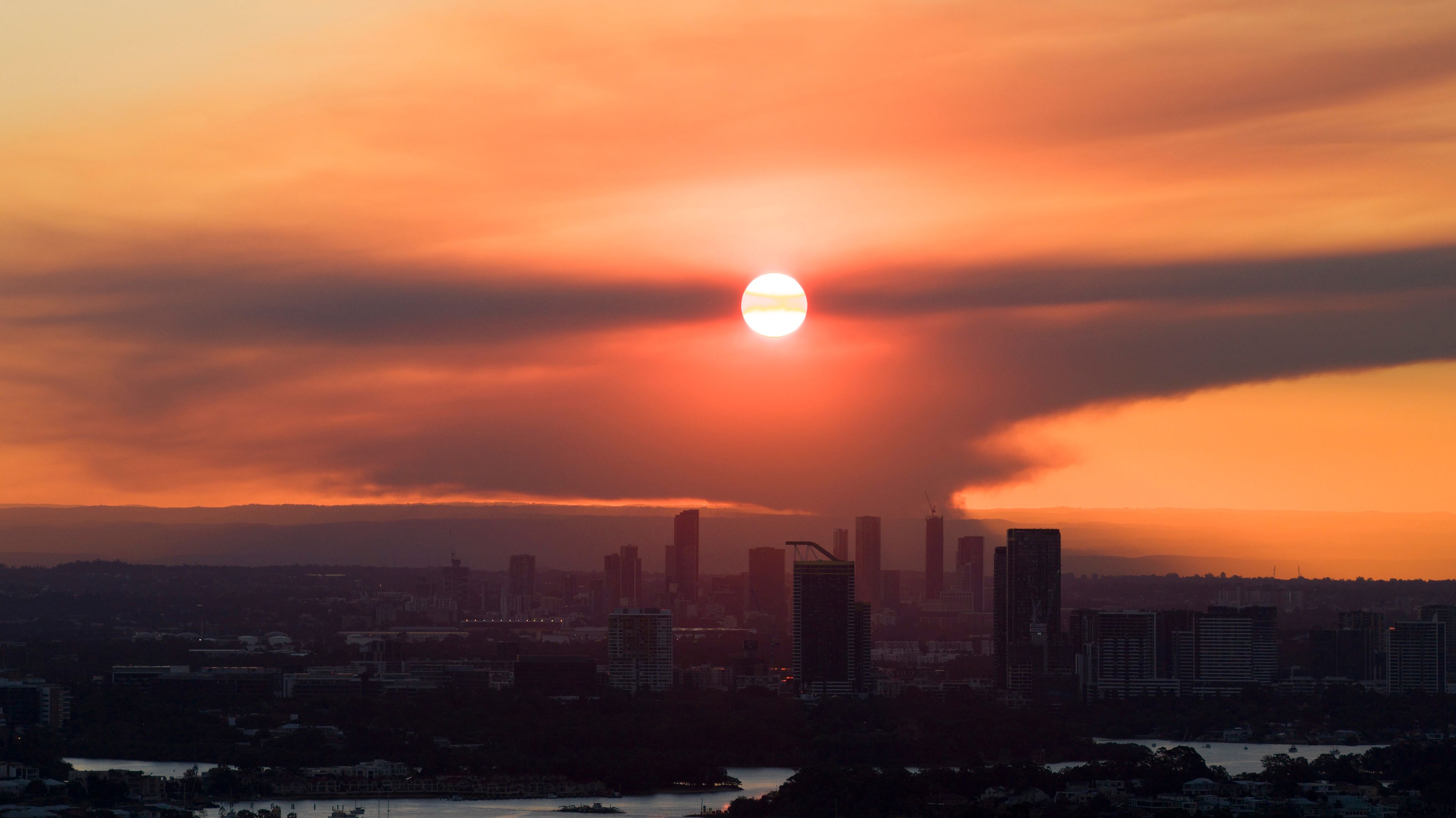 Bushfire smoke hanging over Western Sydney at sunset.