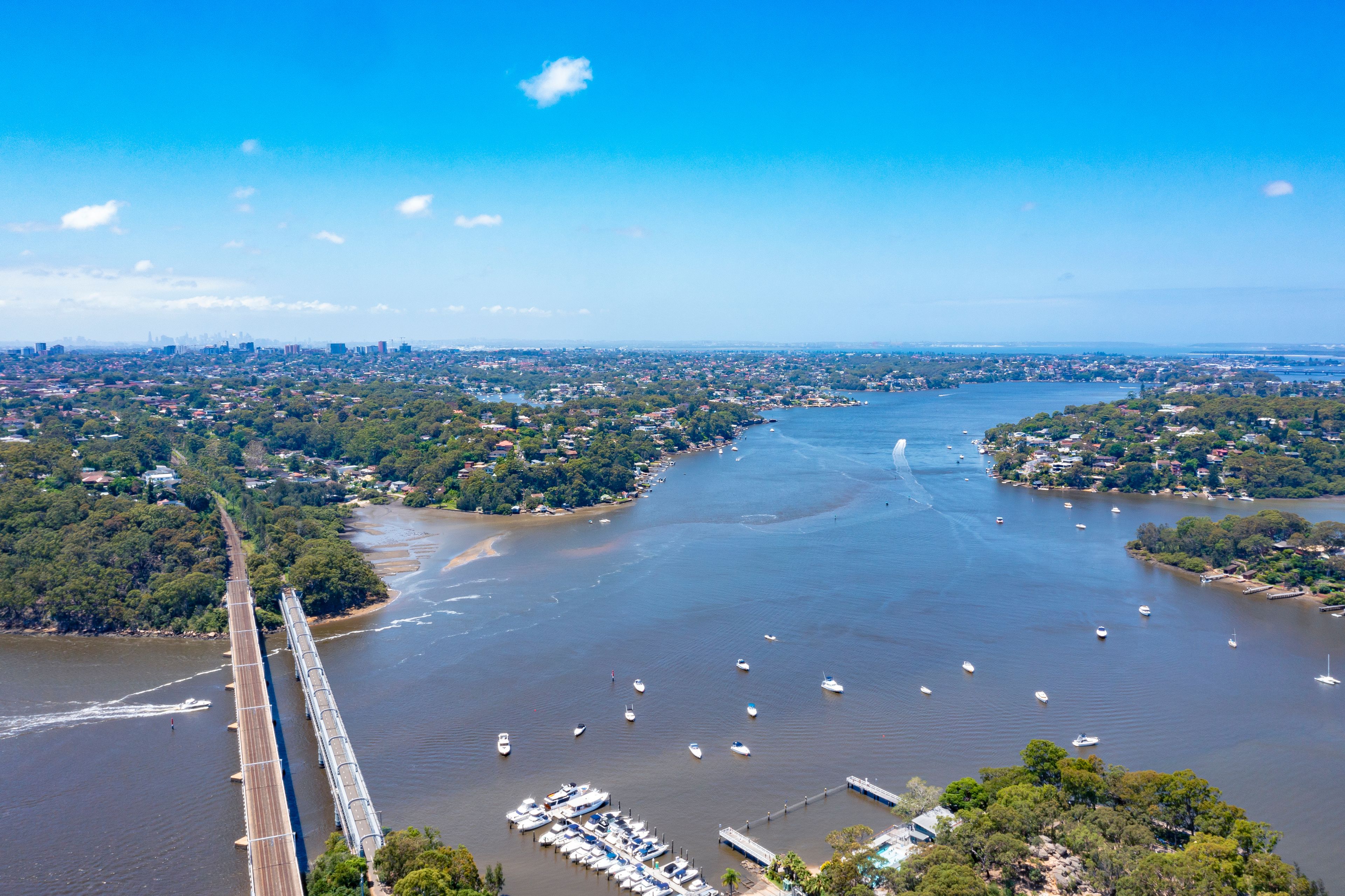 Aerial view of Como Bridge on the Georges River in southern Sydney, Australia during summer on a sunny day 