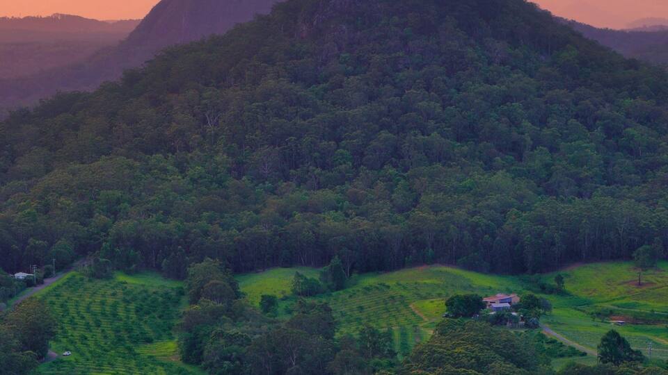 Sunset over the Glasshouse Mountains in QLD - close view