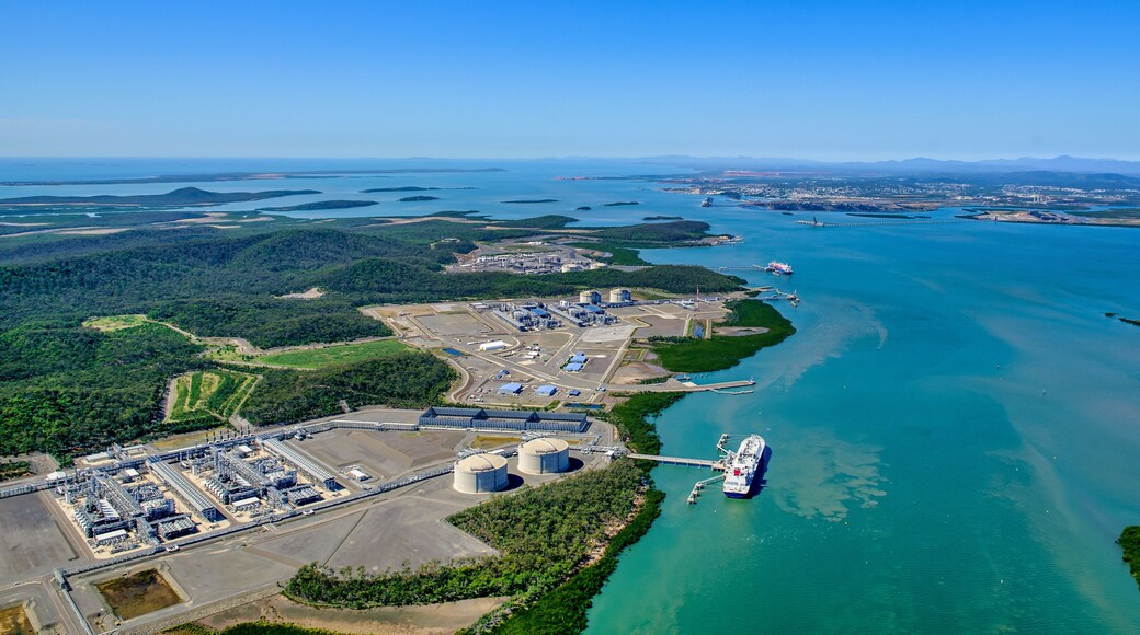 Aerial view of liquified natural gas plant and LNG ship on Curtis Island, Queensland