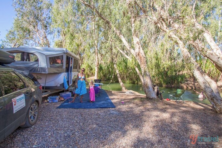 There's a great free campsite by the river at Gregory Downs. It's on the road between Normanton and Adels Grove in Outback Queensland.
Follow the signs to Gregory Downs and once you see the pub take a left then go over the bridge and then take the first left down a dirt road to the river. Kids will love the tubing!