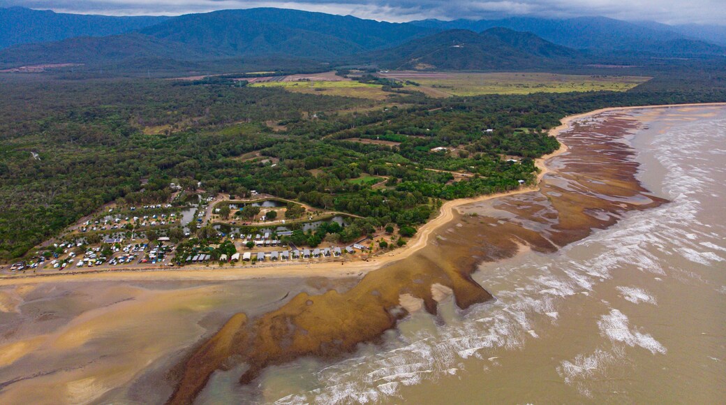 aerial drone panorama of rollingstone creek river mouth in beautiful rural town balgal beach; unique coastline of tropical north queensland near townsville, australia