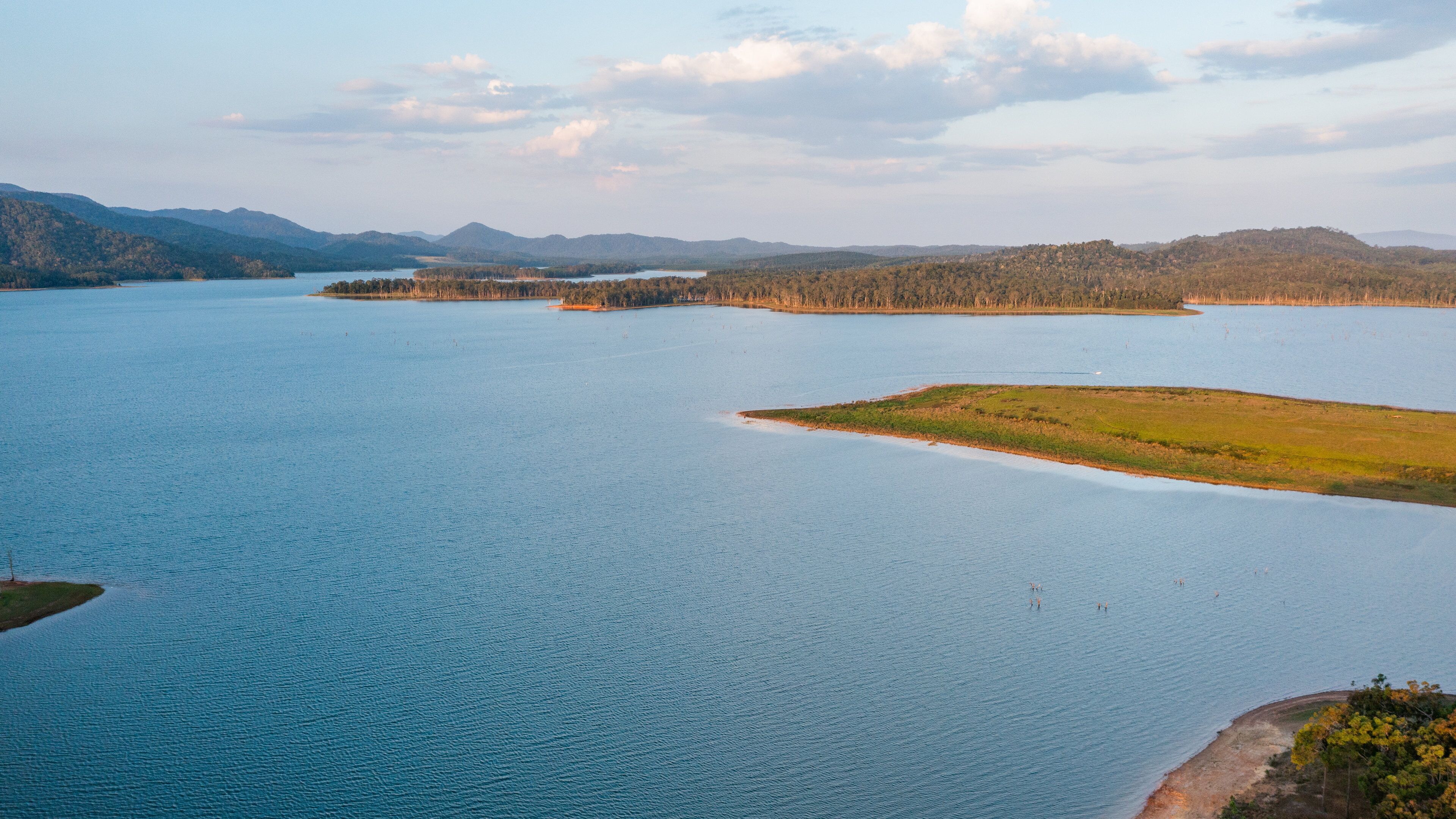 Lake Tinaroo showing a river or creek, a lake or waterhole and landscape views