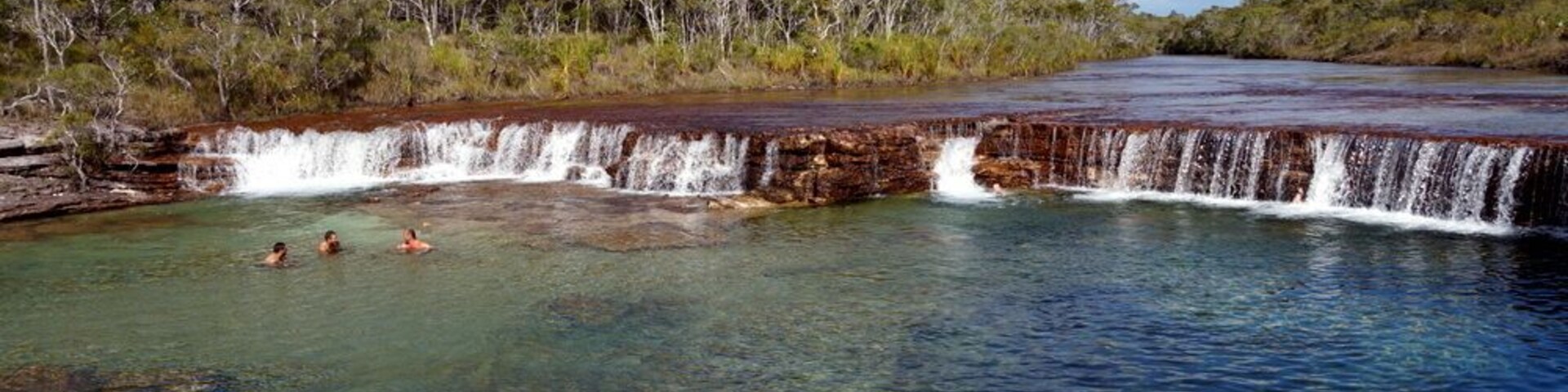 So many of Cape York’s waterways are home to crocodiles, which makes a swim at Fruit Bat Falls all the more special. The falls are a 2.7km drive down a sandy track from the Bamaga Bypass Road and the Old Telegraph Track. After having 30-second showers while bush camping for the last few days, a swim here was heaven!
The road to the falls is best suited to 4WDs (as are most of the roads on the Cape York Peninsula). If it’s busy, finding parking for a van or trailer might be difficult. The falls are very popular. There are toilets here, but no picnic facilities. The site is for day use only.
Eliot Falls and Twin Falls are further down the Old Telegraph Track, but there is a particularly challenging creek crossing on the way.
GPS coordinates: 11.26.24S 142.26.2.42E