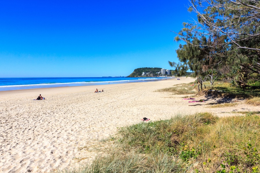 Mermaid beach on a sunny, summer's day,  Burleigh, Gold Coast, Queensland, Australia; Shutterstock ID 1194570541; Purchase Order: SP-2381; Order Number: SP-2381 STAYZ/VRBO/BOOKABACH Nov 2019 - Image R