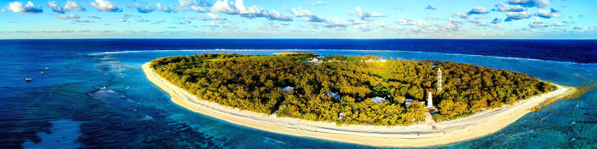 Aerial view of Lady Elliot Island coral reef in Queensland Australia. The lighthouse is visible on the bottom right. This is the first island of the great barrier reef.