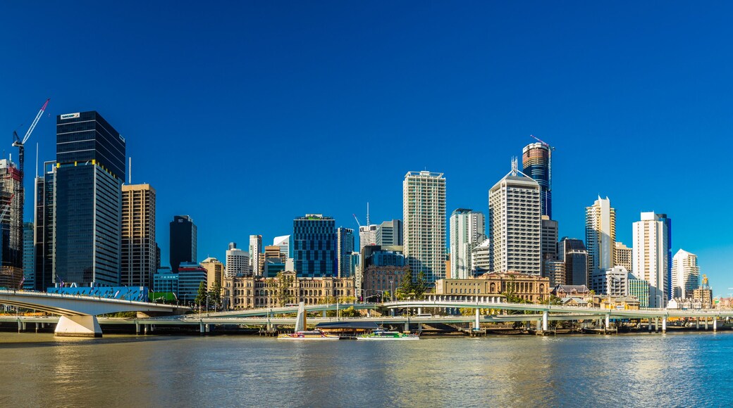 BRISBANE, AUSTRALIA AUG 12 2018: Panoramic view of Brisbane from South Bank over the river.