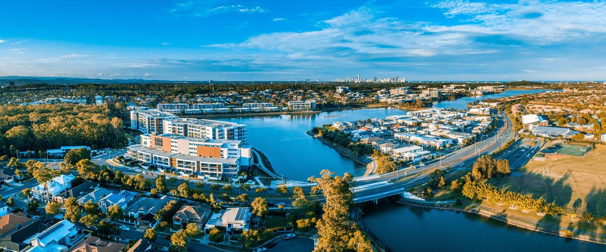 Aerial panorama of Varsity Lakes at sunset. Gold Coast, Queensland, Australia