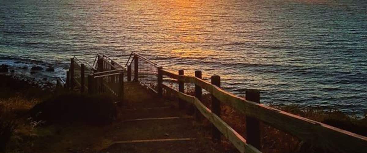Sunset over the ocean at the boardwalk