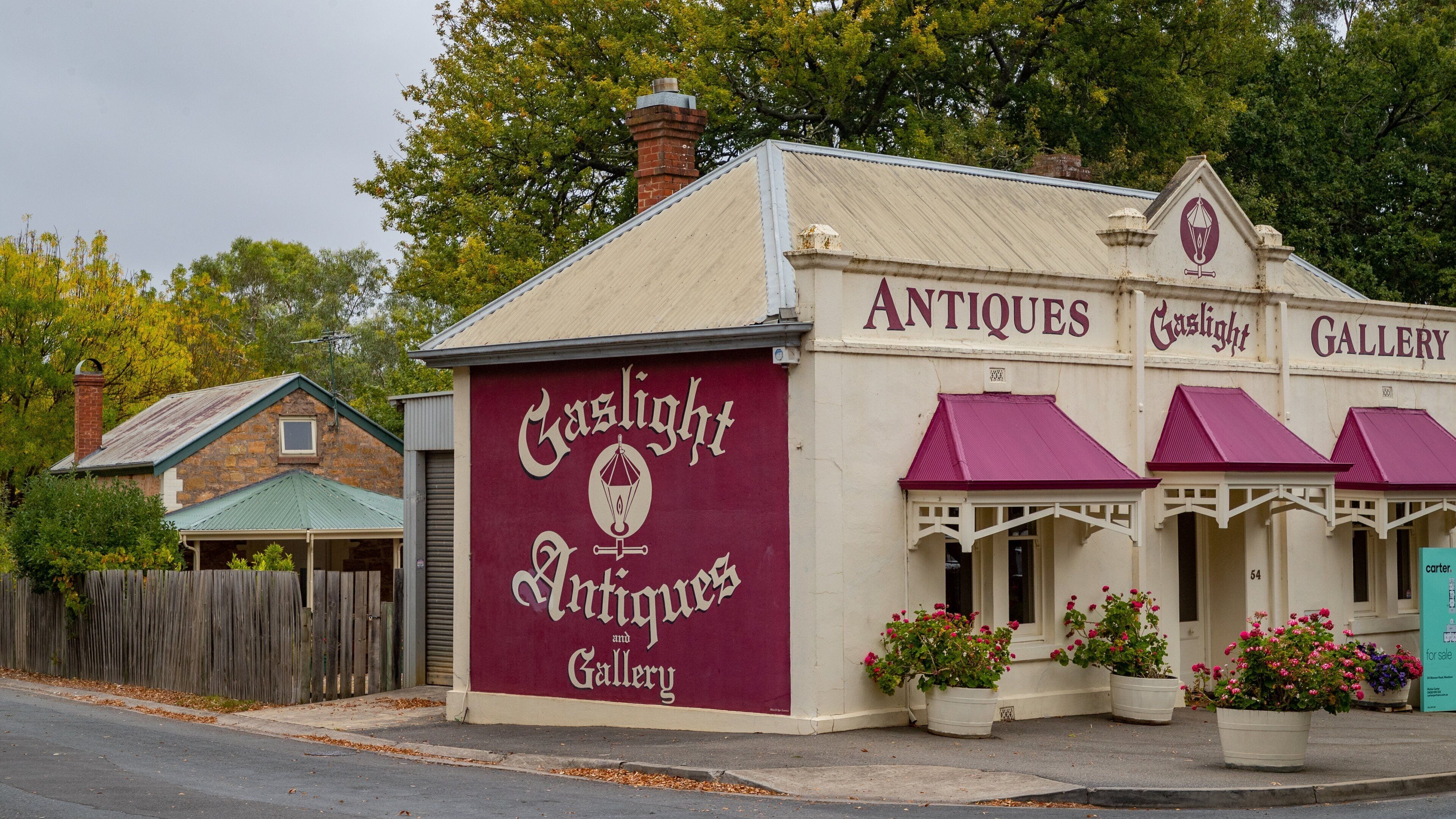 Meadows featuring a small town or village and signage