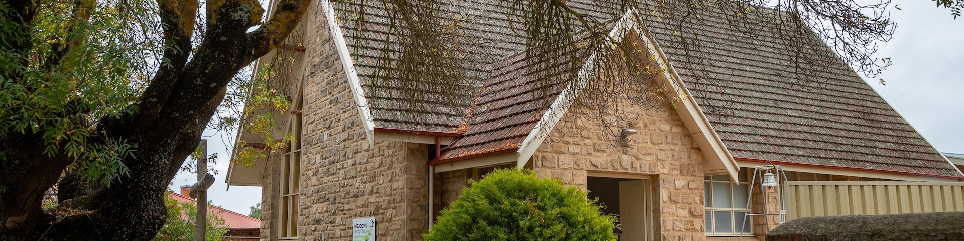 Meadows showing heritage architecture and a church or cathedral