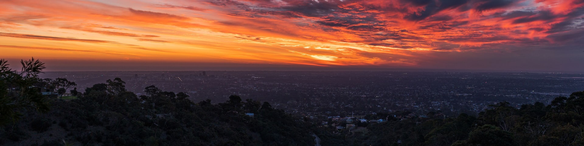 Sunset over Adelaide cityscape from a lookout in the Adelaide hills