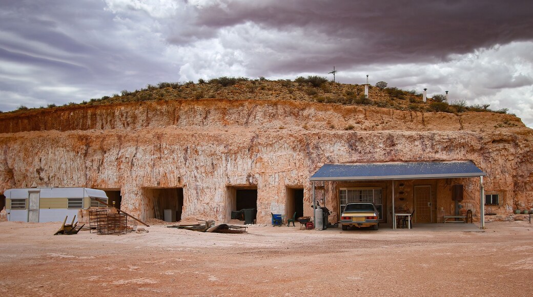 Hillside entrance to a dug out, an underground house in the opal mining town of Coober Pedy in the outback of South Australia