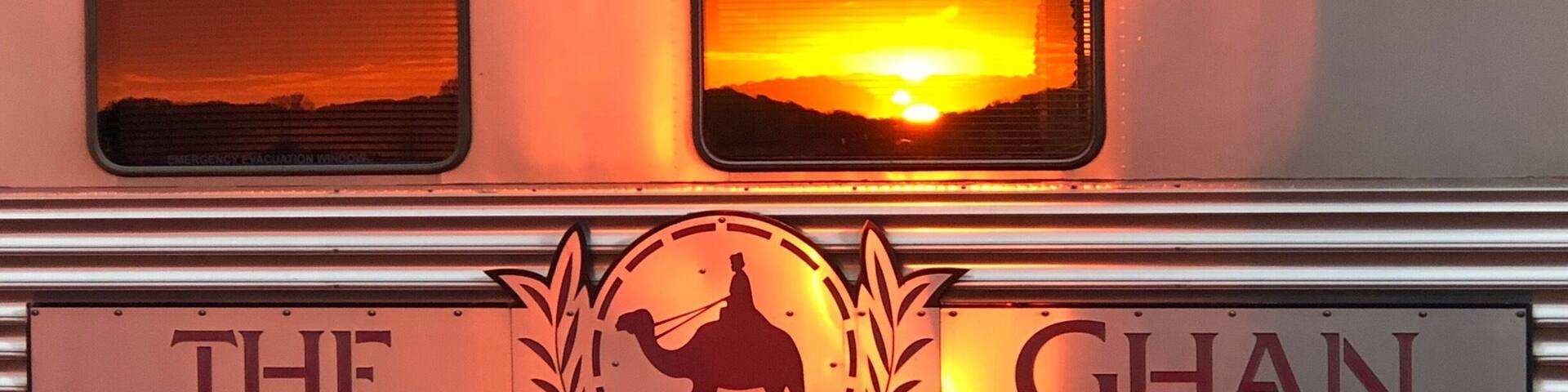 Sunrise at Marla reflected on the Ghan train.
The train crosses Australia from south (Adelaide) to north (Darwin).
A three day 2 night trip and one of the great railway journeys in the world.
