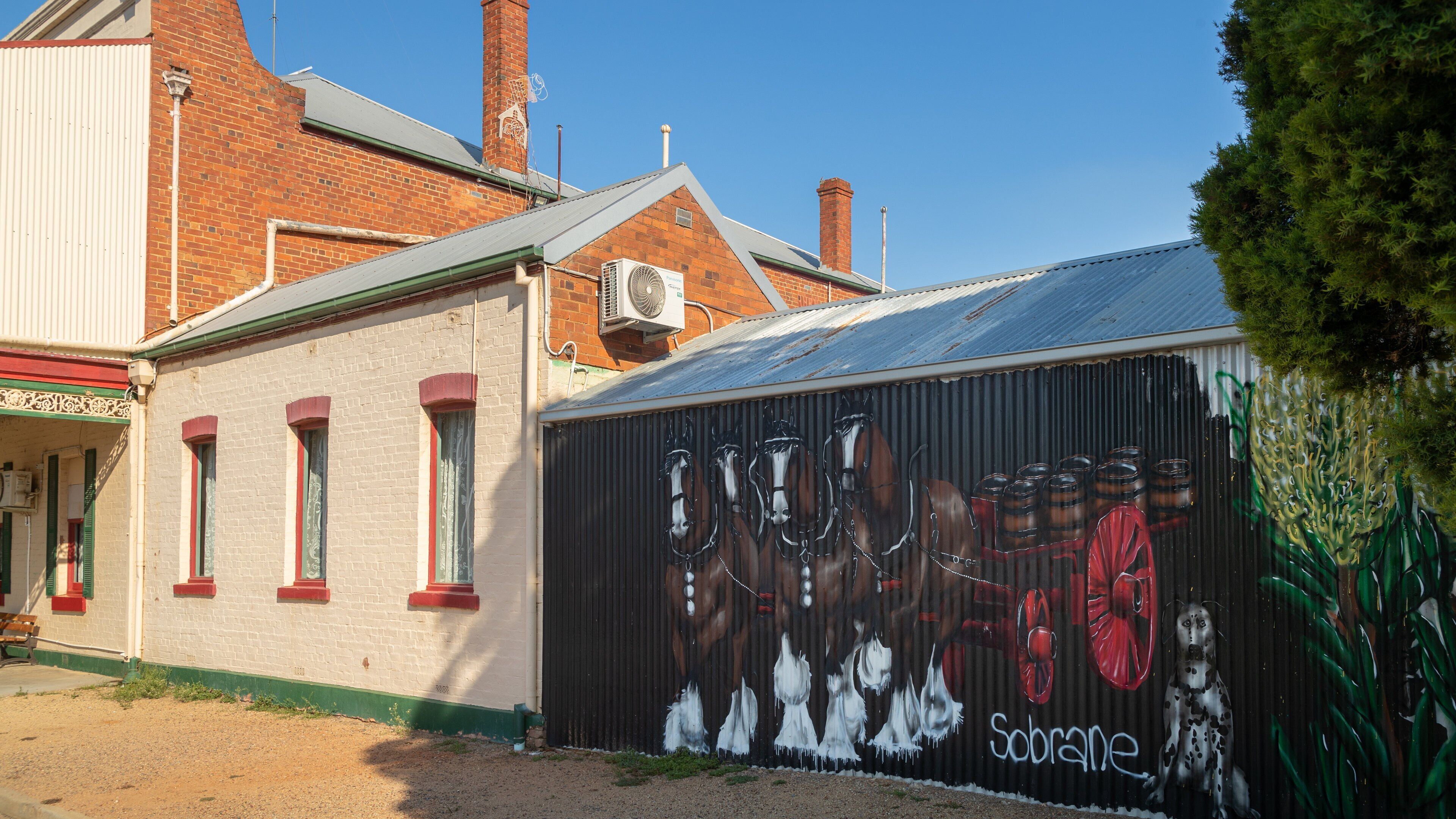 Tungamah featuring a small town or village and outdoor art