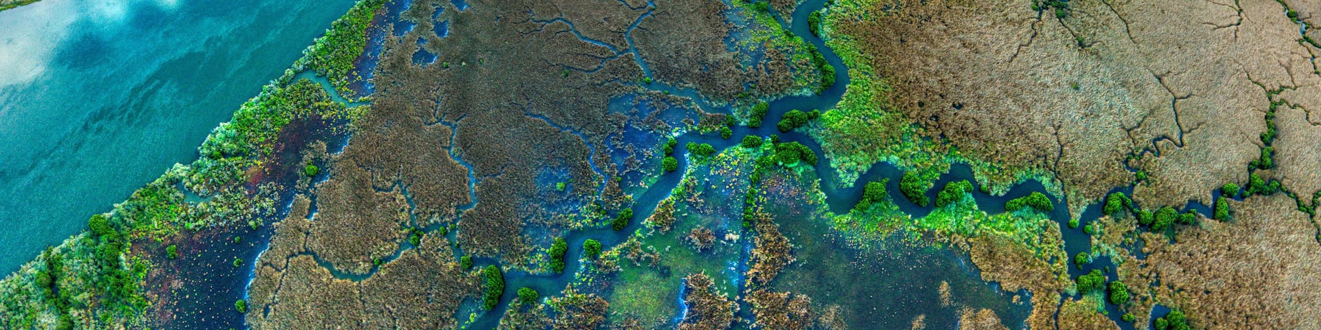 Drone view of the Barwon River and Lake Connewarre upstream of and Barwon Heads, Victoria, Australia.