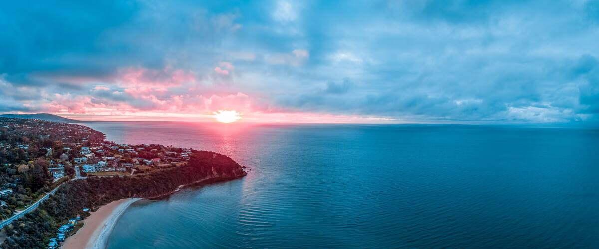Sunset over Port Phillip Bay in Australia - wide aerial panorama