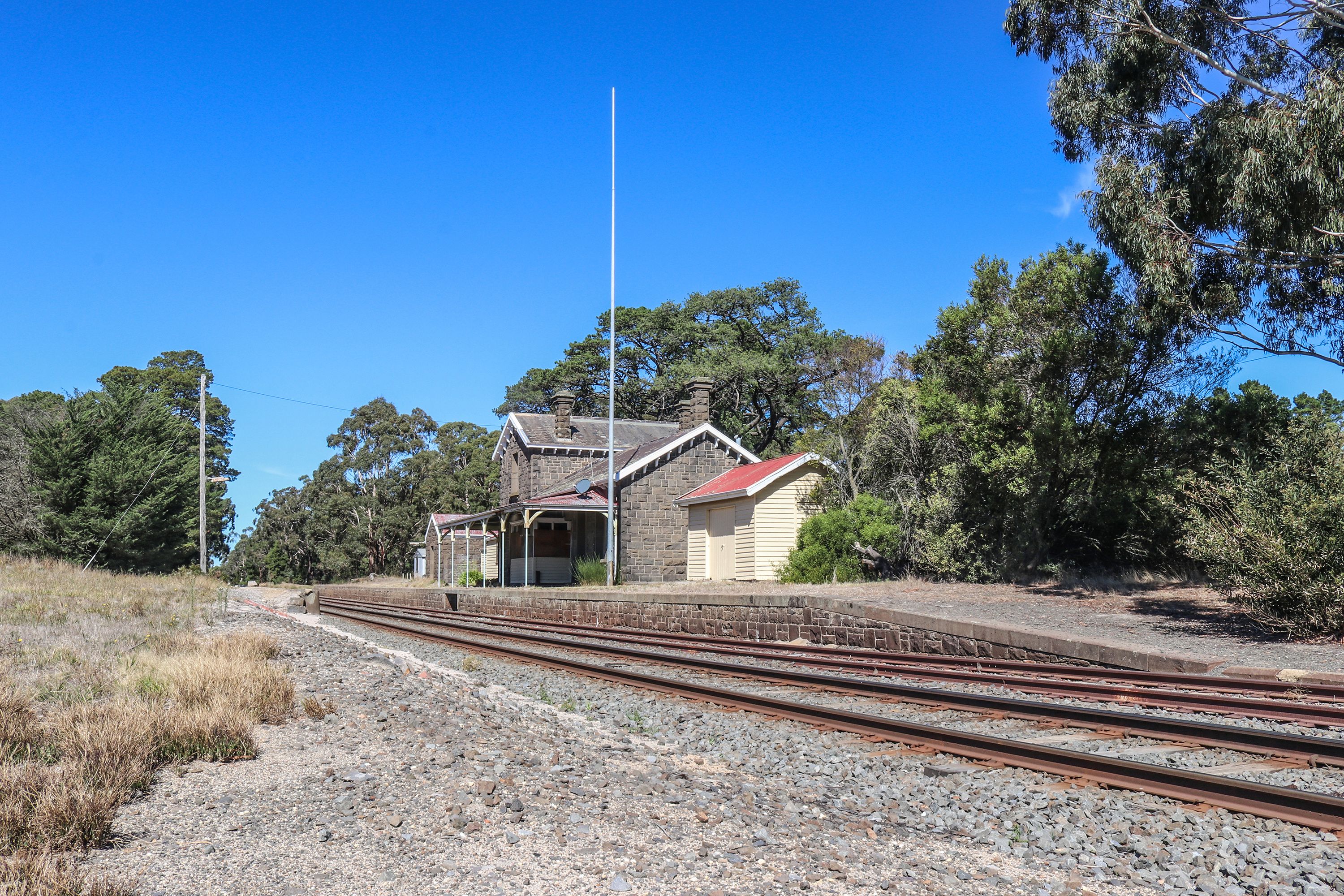 The Lal Lal railway station (1863), a single-storied bluestone building with a two-storied residence attached, was disestablished as a staffed station in 1983