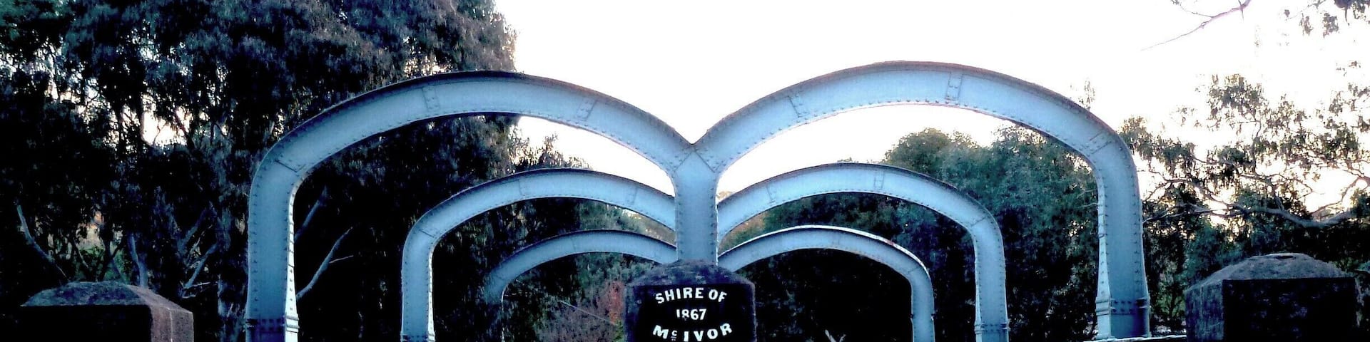 I have no idea why these arches exist over this old bridge. I guess they stop large trucks...