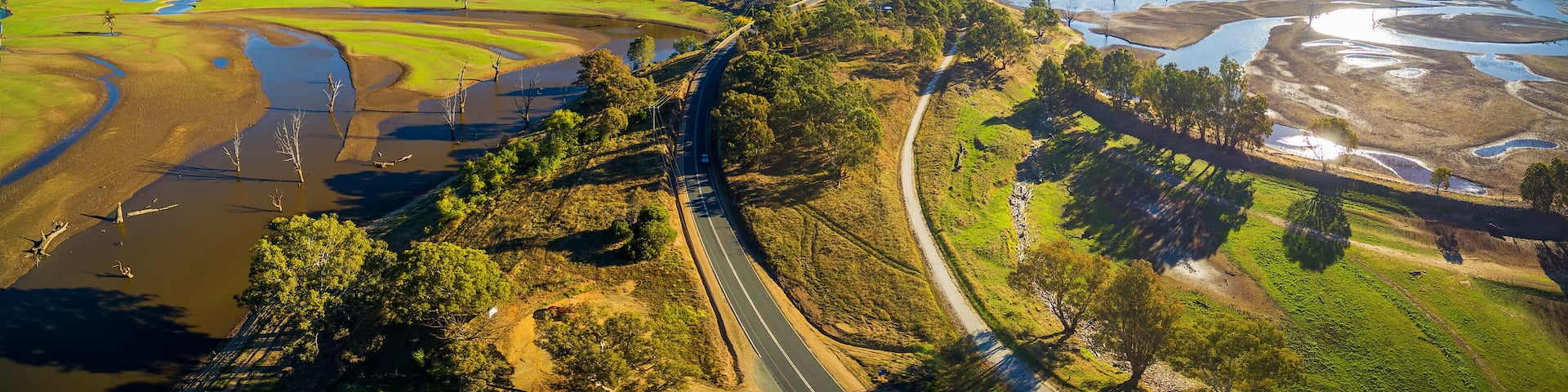 Aerial panorama landscape of Murray Valley Highway and bridge over Lake Hume on bright sunny day. Victoria, Australia