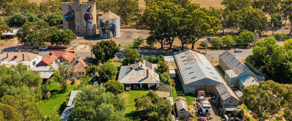 Devenish which includes landscape views and a small town or village