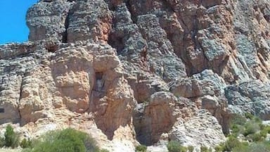 You can climb it with and without ropes, there is a trail going from bottom to top, which is steep, or there are rock climbing and abseiling lessons around the area for beginners, or bring your own/ rent your own equipment.