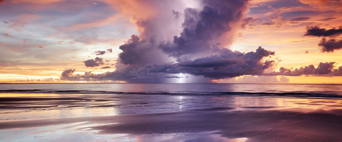 Darwin Sunset Lightning with dramatic anvil cloud over the beach