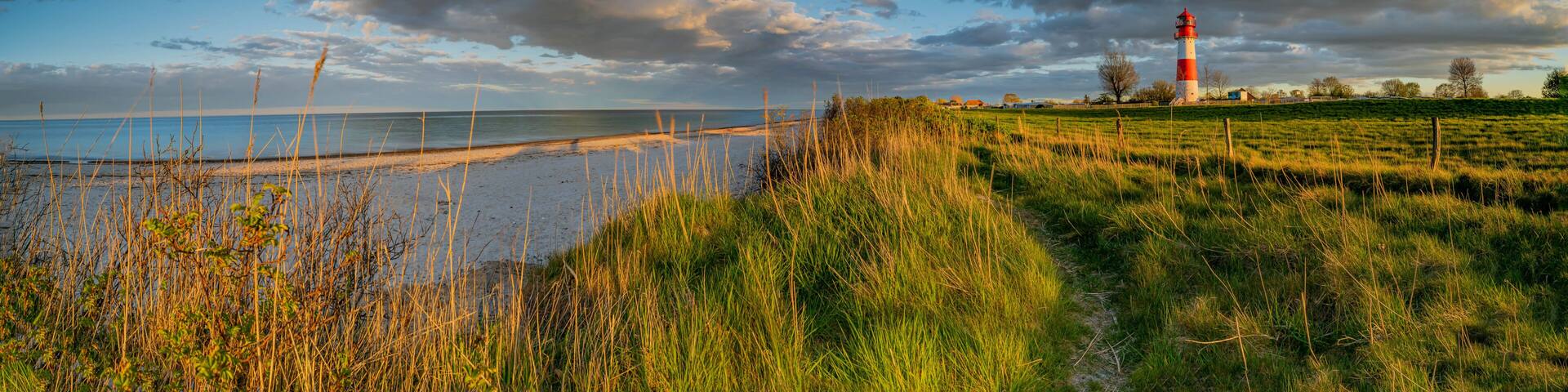 Breathtaking beautiful panorama of coastal landscape at the Baltic Sea at the Falshöft lighthouse Geltinger Birk, Schleswig-Holstein, Germany, stunning view from Baltic Sea coastline with sandy beach