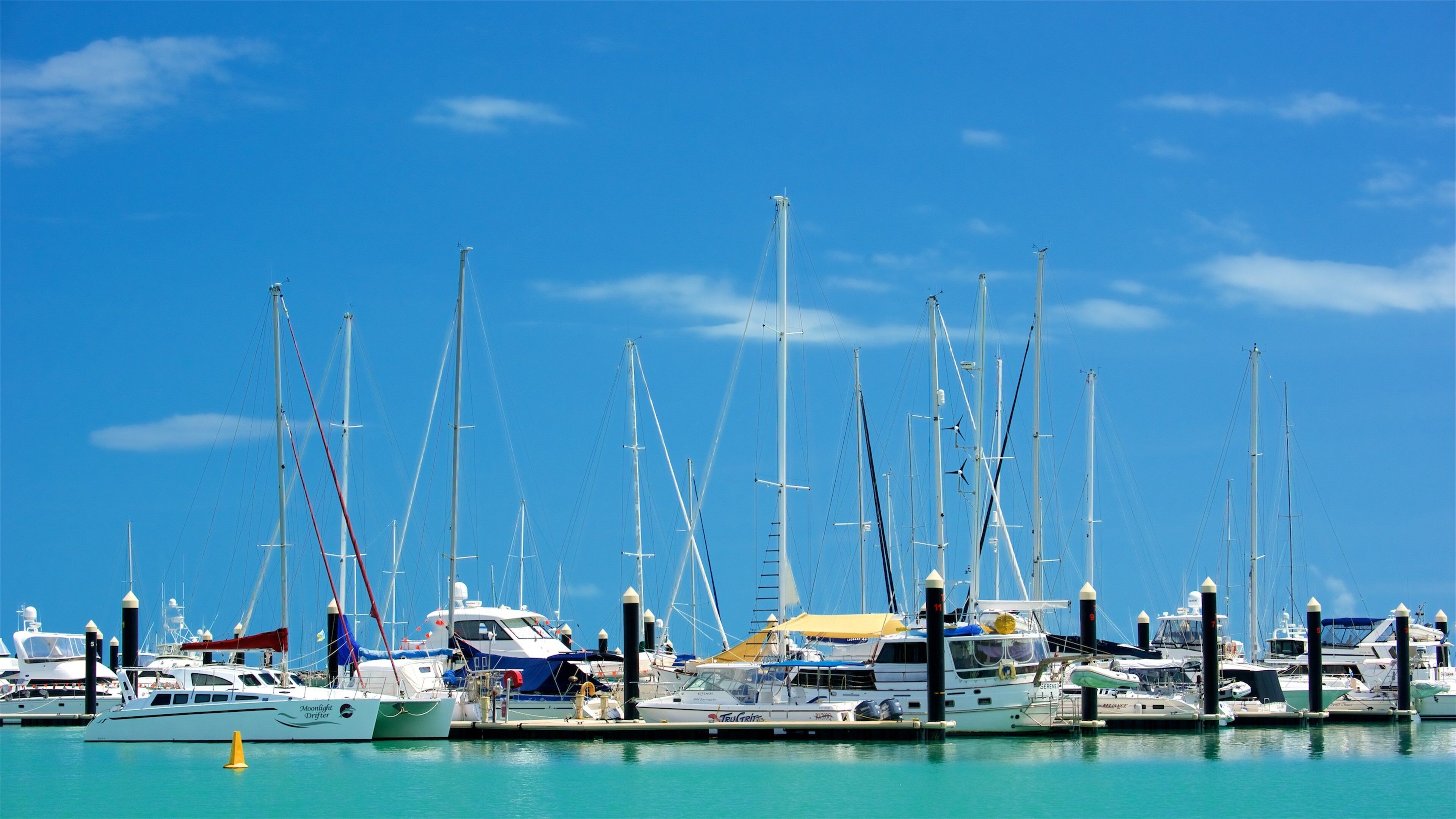 Airlie Beach which includes sailing, boating and a bay or harbour