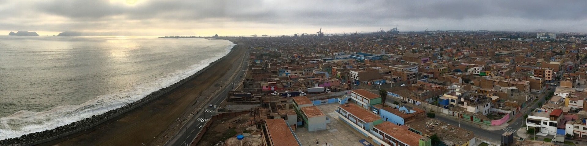 Amazing view from our Airbnb of the Callao district of Lima, Peru. This area is unfortunately impacted by Peru’s multitude of tremors and earthquakes but there is still promise for rebuilding of infrastructure. I think fondly of the colorful buildings and the kindness of the locals we encountered. 
#Lima
#Peru
#UrbanJungle