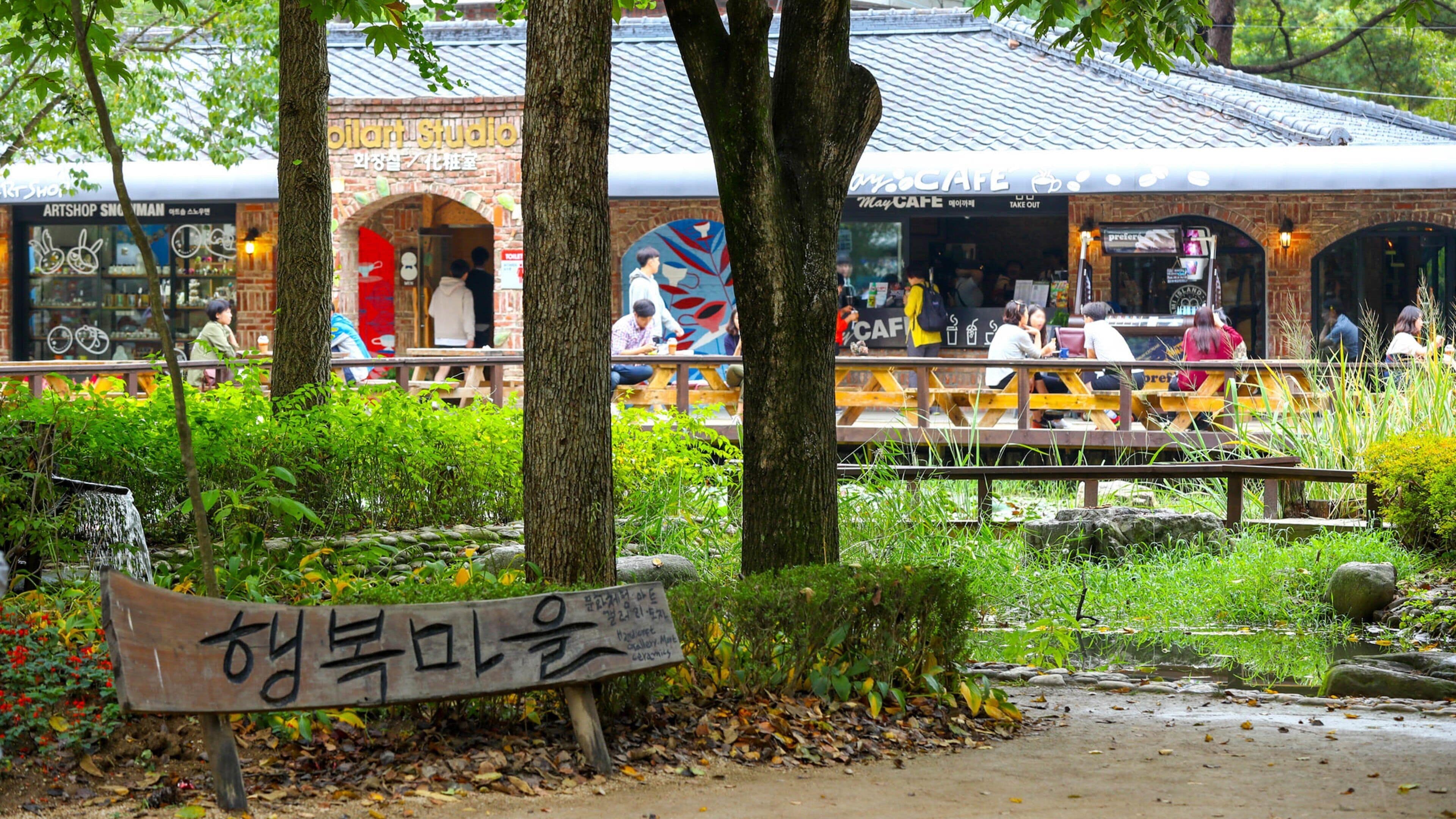 Nami Island featuring signage and a park