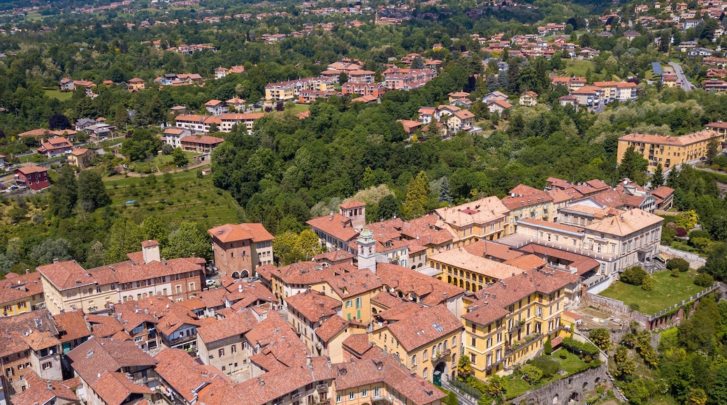 A mountainous landscape with a town nestled in the valley.