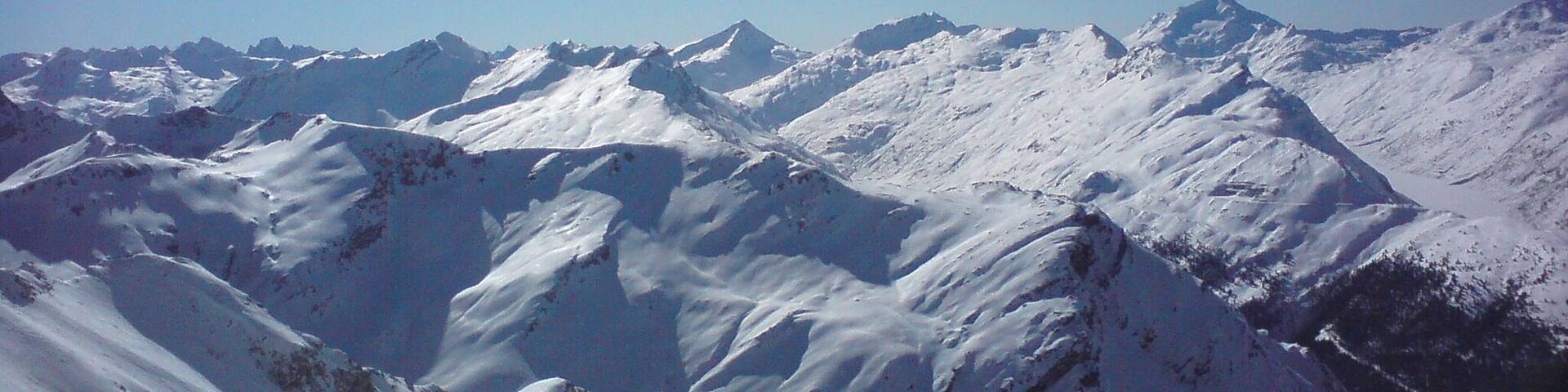 From Pizzo Badile over Pizz Gallagiun to Pizzo Stella and Lago di Lei from Piz Alv, Riom-Parsonz, Ferrera, Avers, Italy, Grison, Switzerland