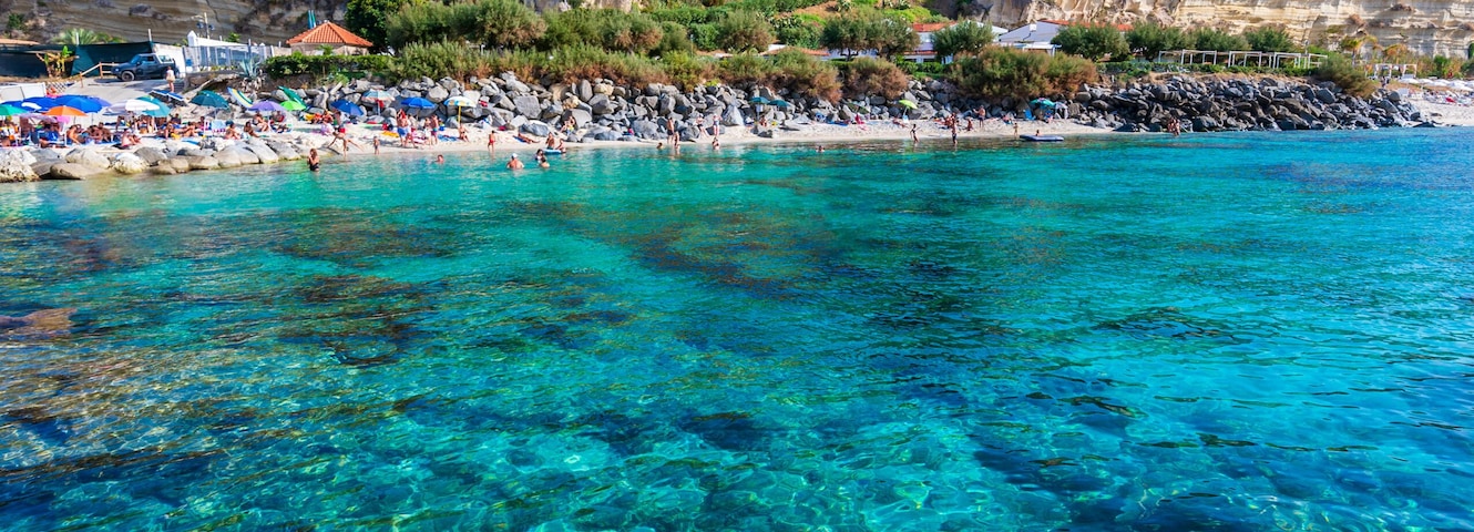 Spiaggia di Riaci - paradise beach and coast scenery at Santa Domenica, travel destination in Italy