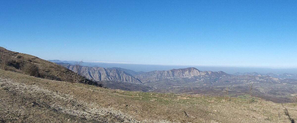 A mountainous landscape with a clear sky.