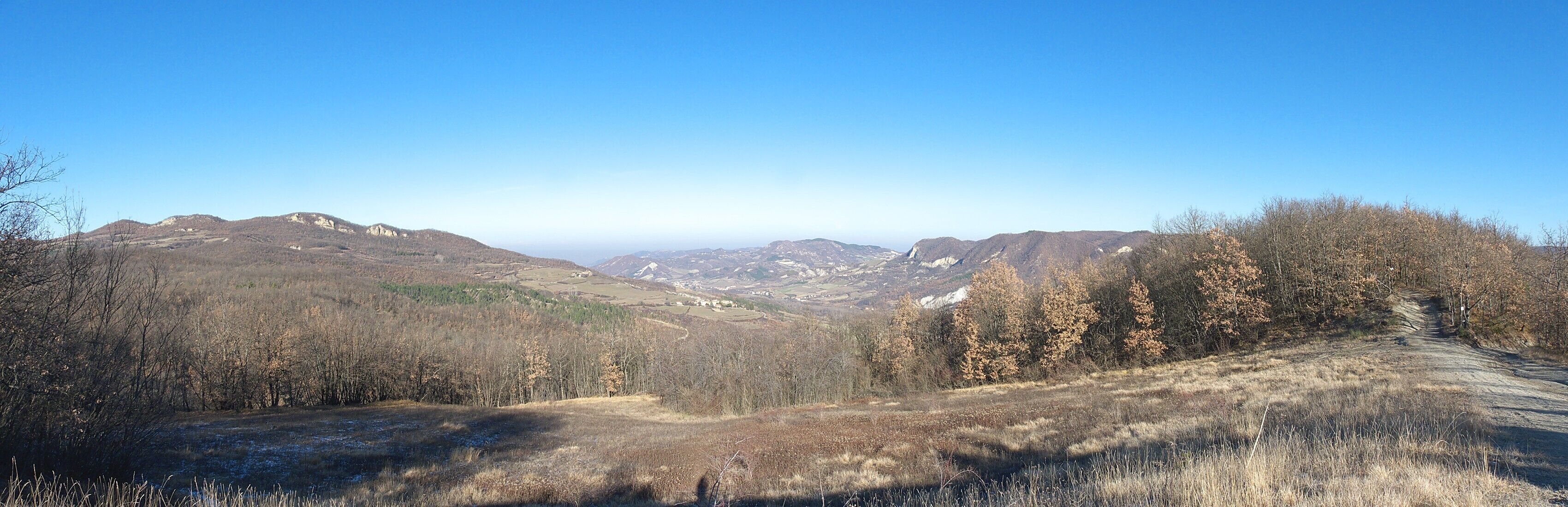 A mountainous landscape with a clear sky.
